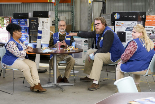 SUPERSTORE -- "Conspiracy" Episode 609 -- Pictured: (l-r) Carla Renata as Janet, Amir M. Korangy as 