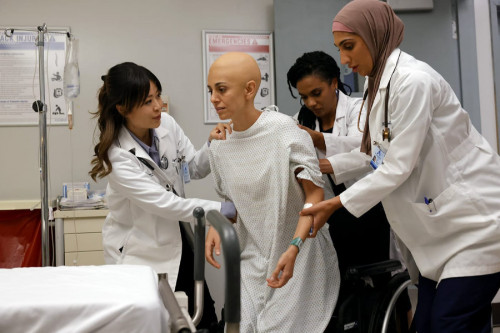 NEW AMSTERDAM -- "Paid in Full" Episode 408 -- Pictured: (l-r) Christine Chang as Dr. Agnes Kao, Mar