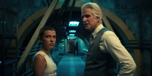 STRANGER THINGS. (L to R) Millie Bobby Brown as Eleven and Matthew Modine as Dr. Martin Brenner in S